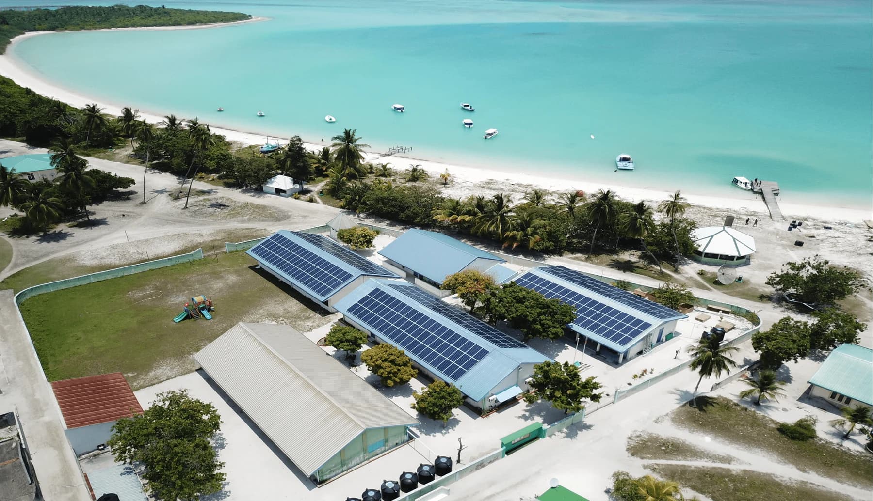 Solar panels beside a Maldivian lagoon, in a photograph released by the environment ministry in December 2021.