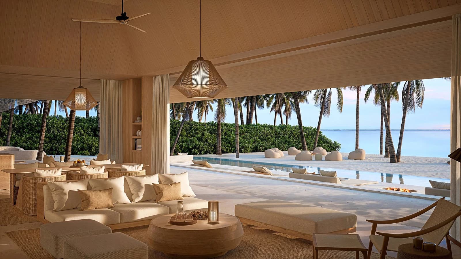 Architectural rendering of an Aman Maldives beach pavilion overlooking a pool, palm trees and the sea