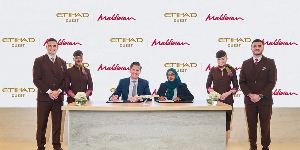 Etihad Guest and Maldivian representatives at the partnership signing, pictured in the September 2026 press announcement.