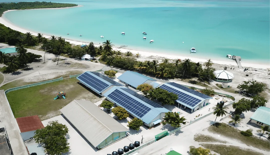 Solar panels beside a Maldivian lagoon, in a photograph released by the environment ministry in December 2021.