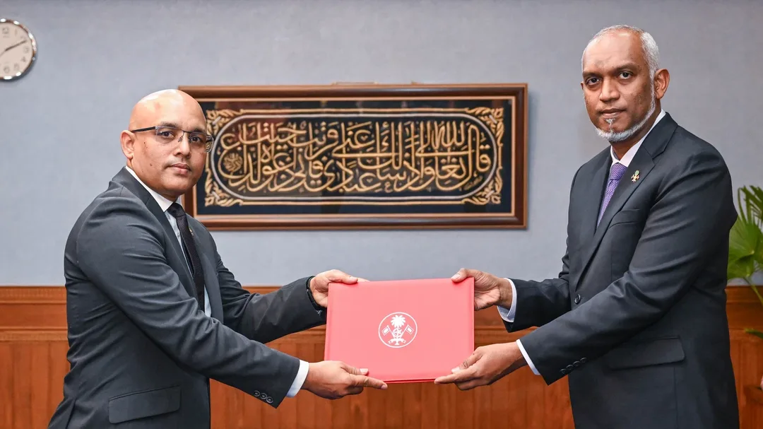 Hassan Zareer receives his appointment as Finance Minister from President Mohamed Muizzu on 8 June 2026.